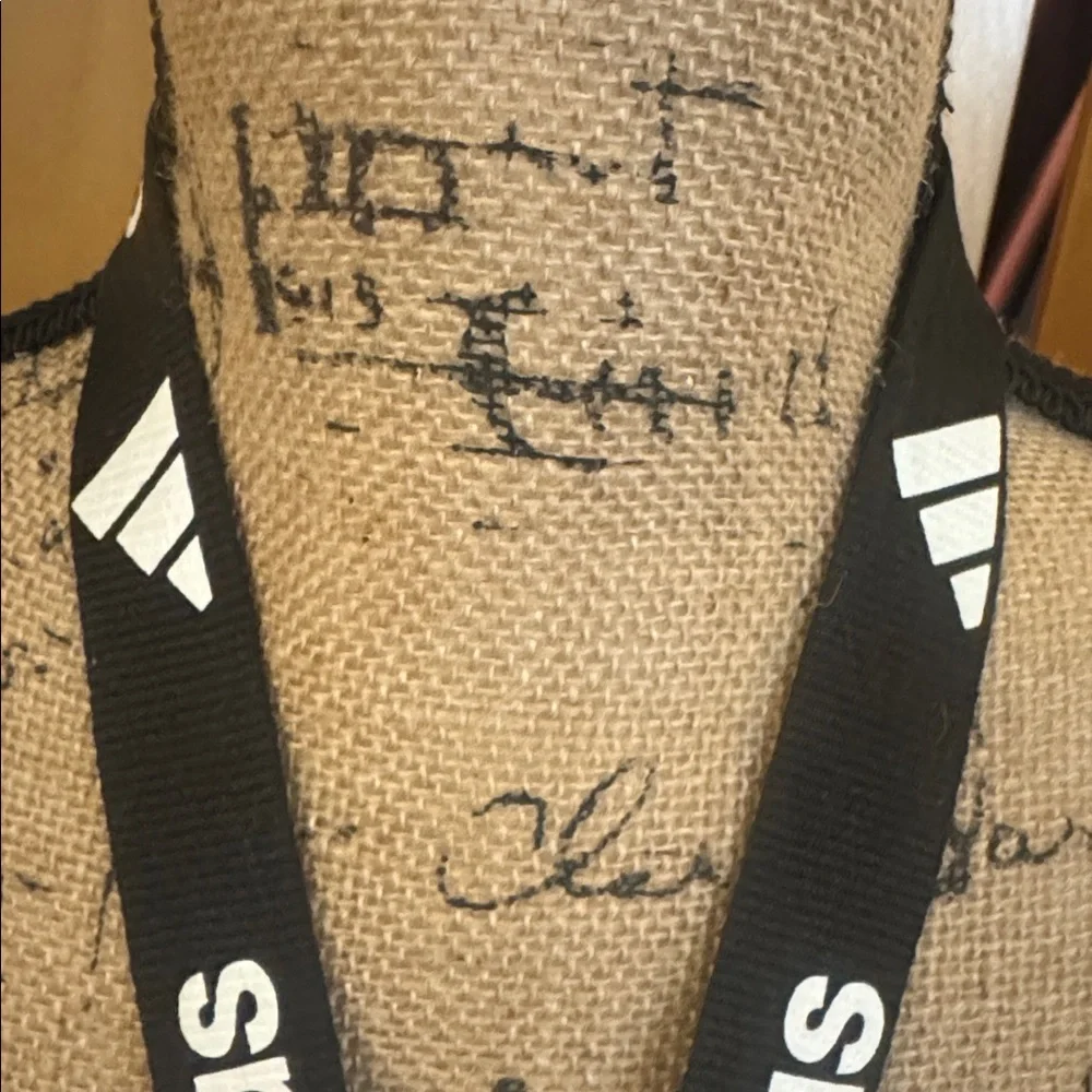 Barely used authentic ADIDAS lanyard with pinch clip off section on bottom.